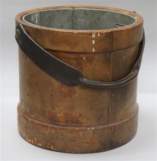 A leather fire bucket with zinc liner